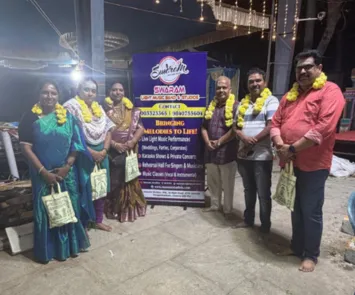 Group photo at temple event with Swaram music band members