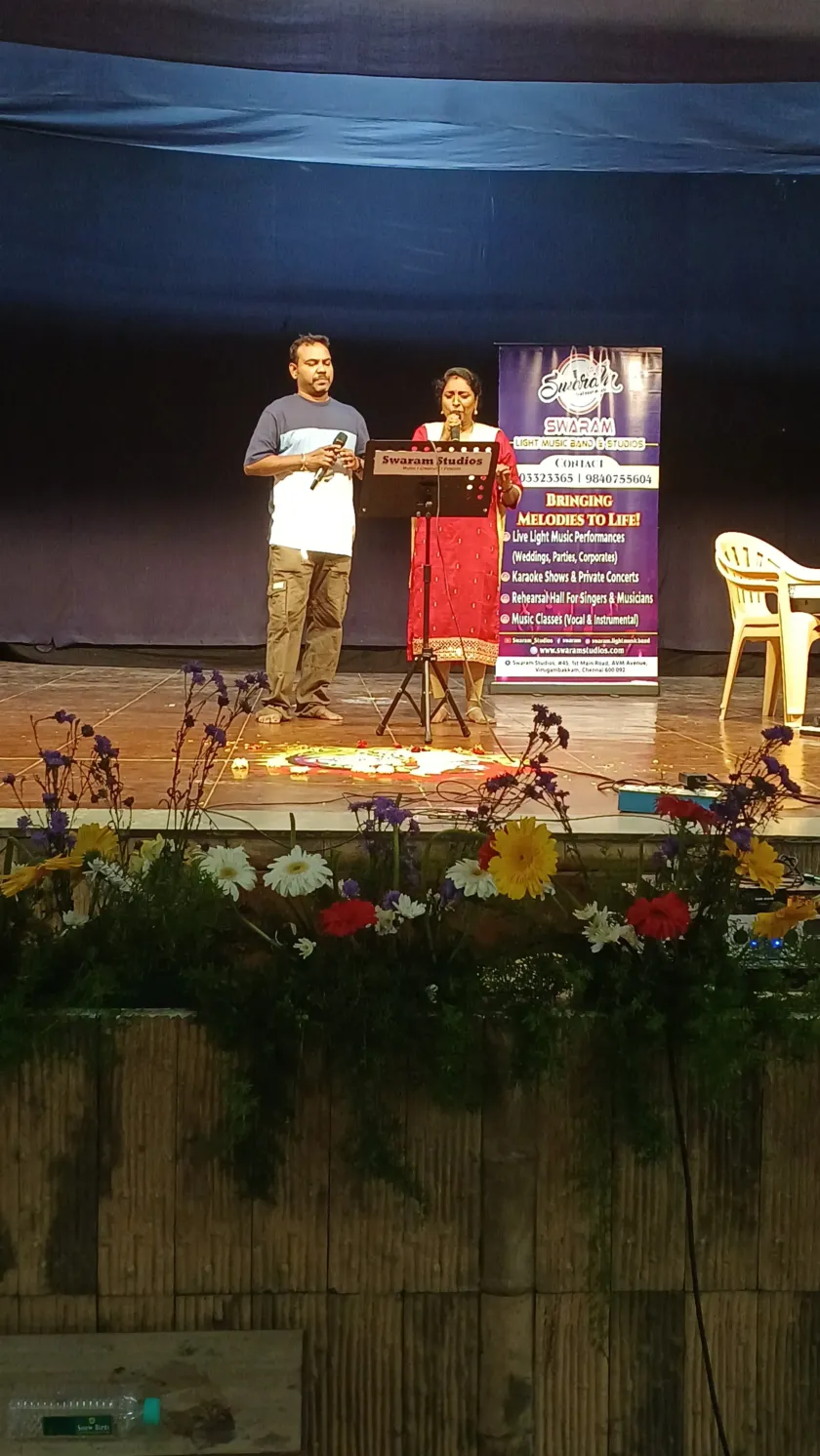 Live music stage setup with Swaram Studios banner