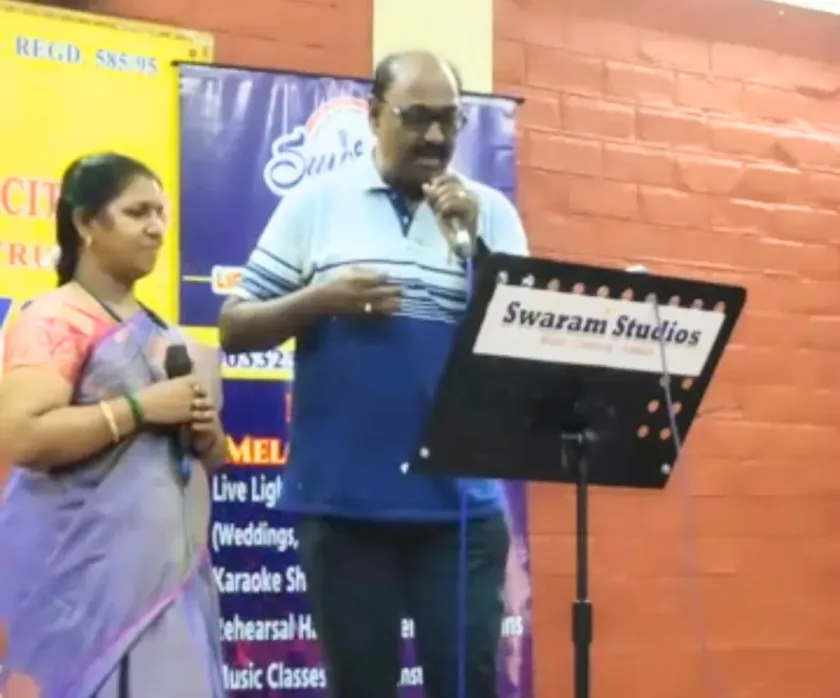 Male singer with female partner at music program