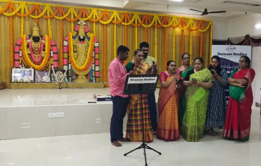 Group singing performance at cultural function