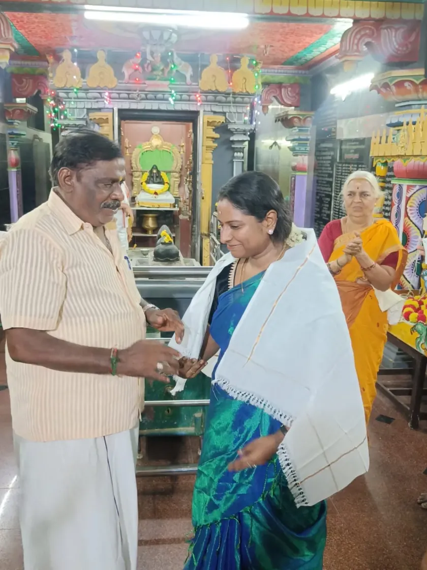 Honoring guest with traditional shawl ceremony