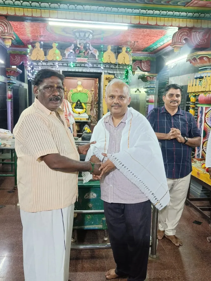 Cultural recognition event inside temple hall