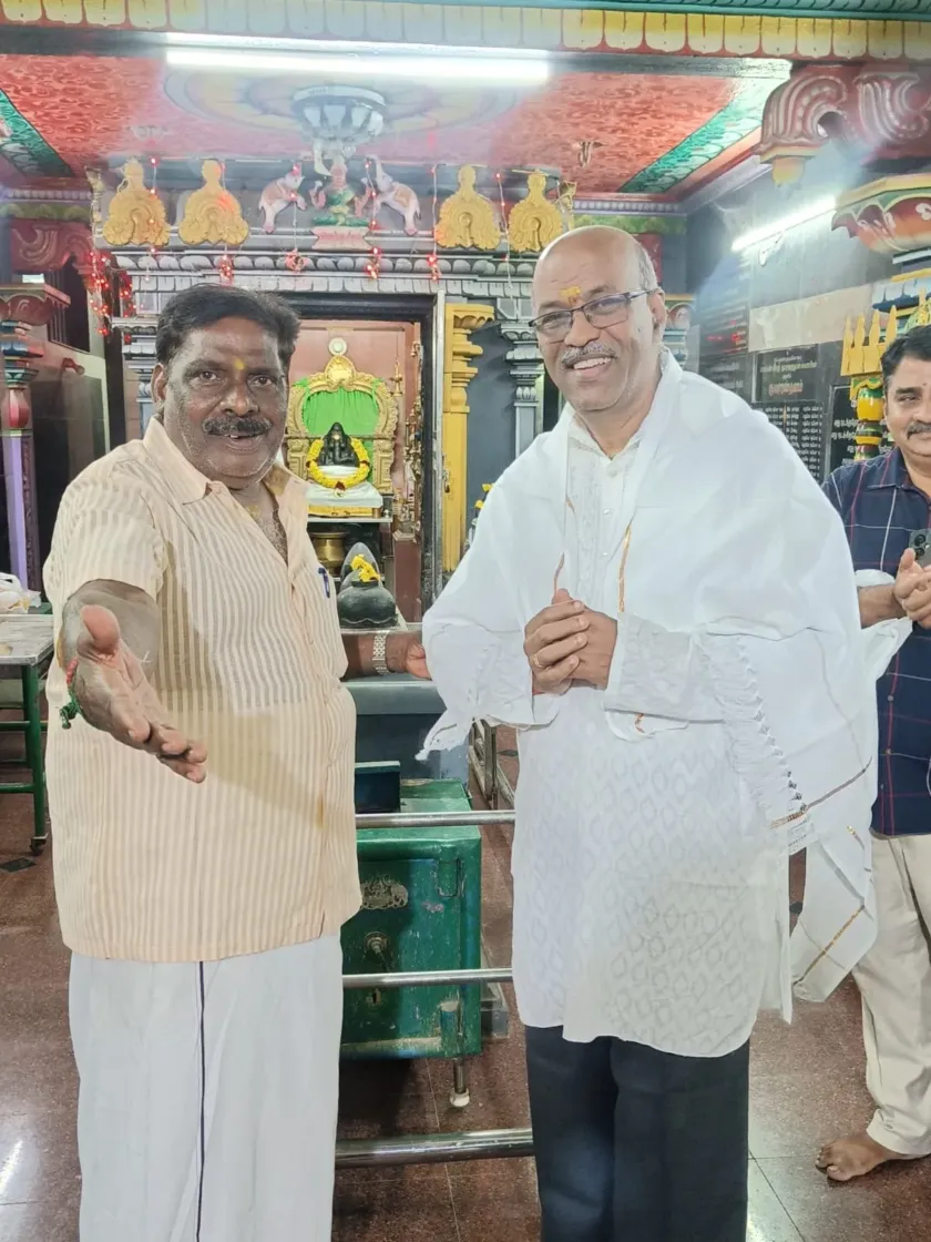 Guest honored with shawl at temple function