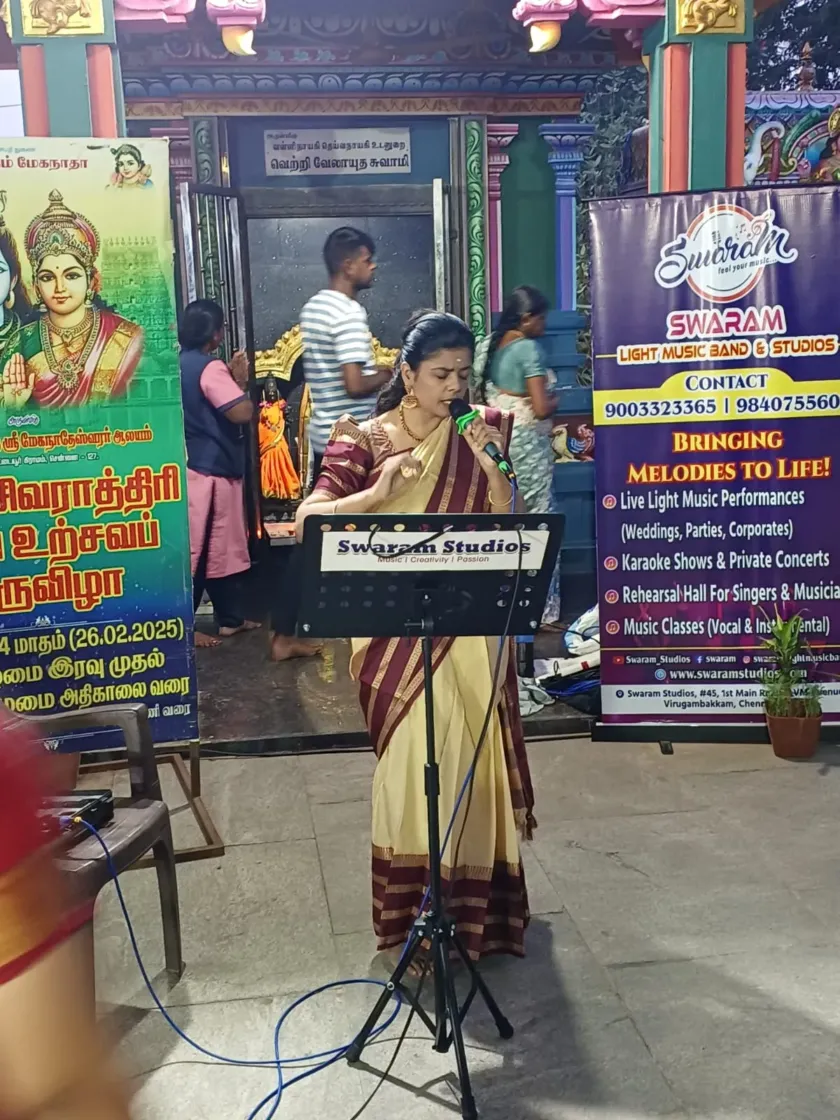 Female singer performing at Swaram Studios stage