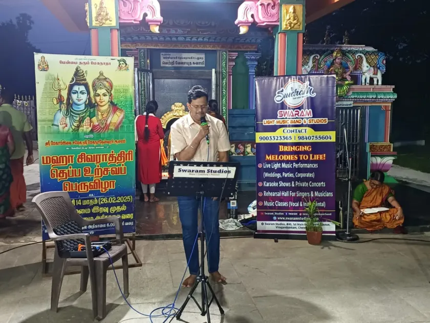 Man singing at temple cultural program