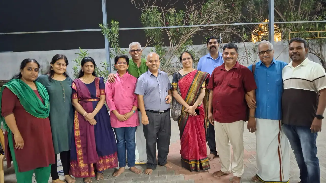 Group photo at cultural event with families and friends outdoors