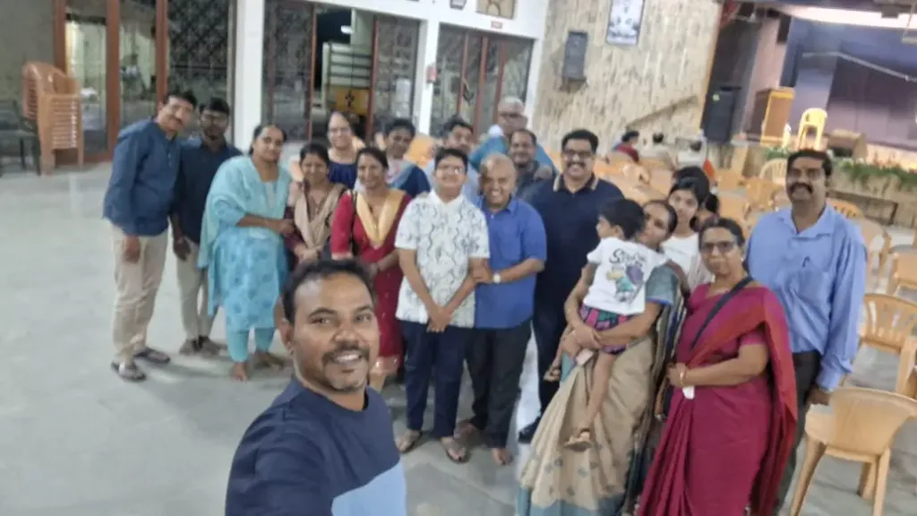 Group selfie at cultural event with families and friends