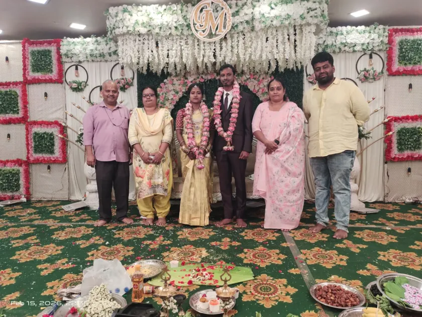Wedding group photo at decorated stage ceremony