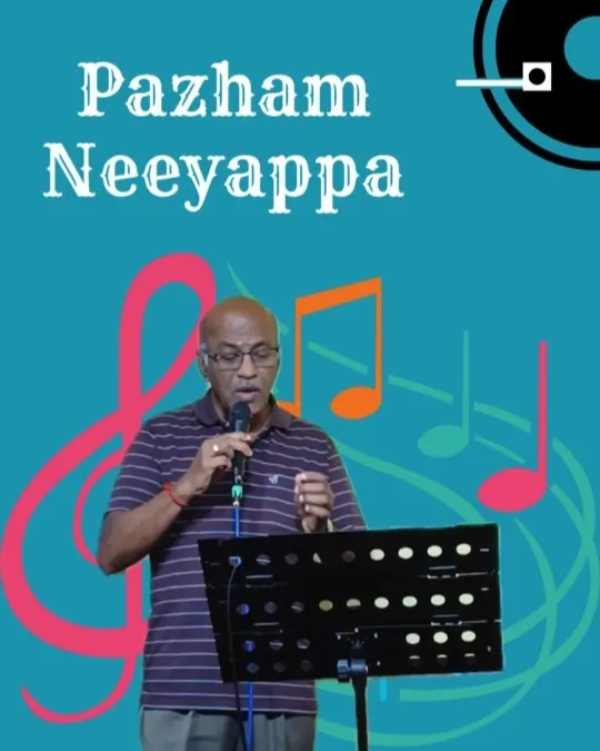 Male singer performing classical song with mic and music stand