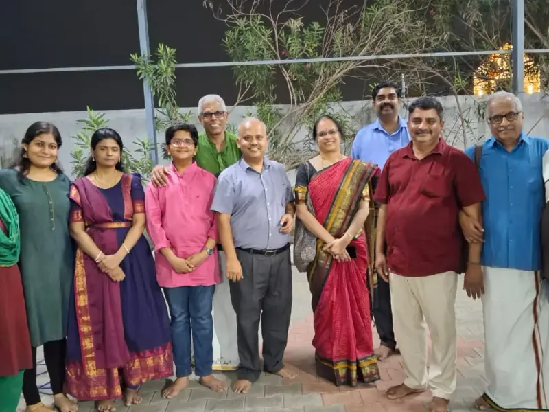 Group photo at cultural event with families and friends outdoors