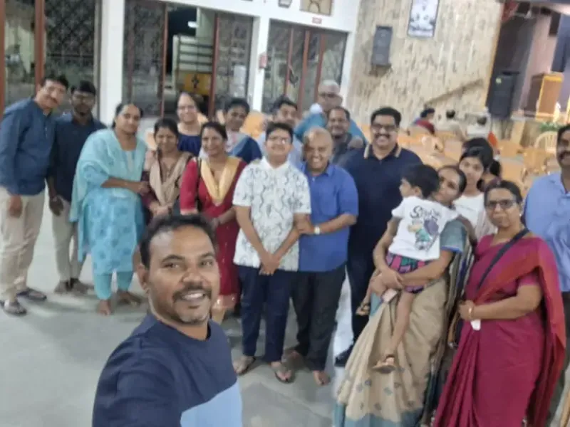 Group selfie at cultural event with families and friends